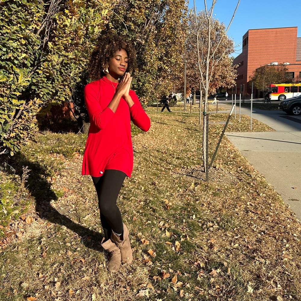 Red long sleeved blouse with  button low turtleneck neck